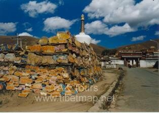 Colored engraved Mani stones outside Litang monastery